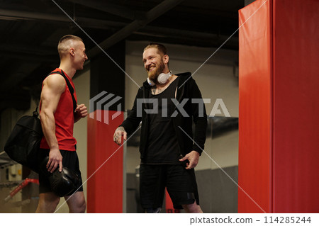 Two young cheerful male athletes Two young cheerful male athletes 114285244