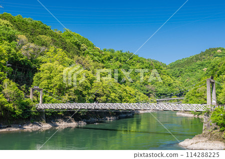Amagase Bridge, a suspension bridge over the Uji River, Uji City, Kyoto Prefecture Amagase Bridge, a suspension bridge over the Uji River, Uji City, Kyoto Prefecture 114288225
