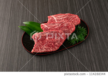Domestic Japanese Black Beef Rump Steak, 3 slices on a plate 114288344
