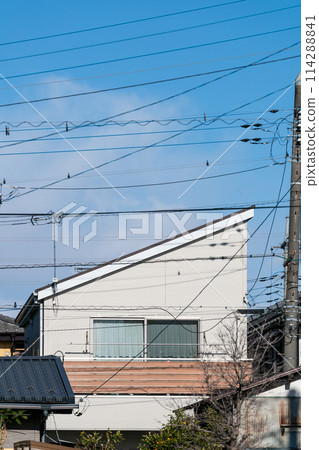 Two-storey detached house with a sloping roof 114288841