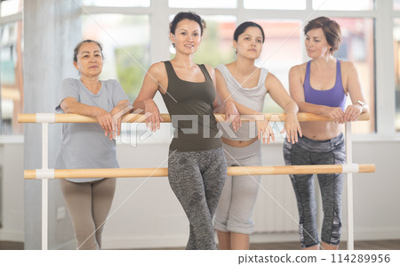 Rest after ballet classes - women of different years relax after lesson at ballet school 114289956
