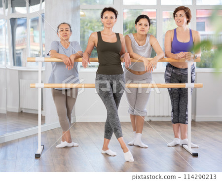 Rest after ballet classes - women of different years relax after lesson at ballet school 114290213