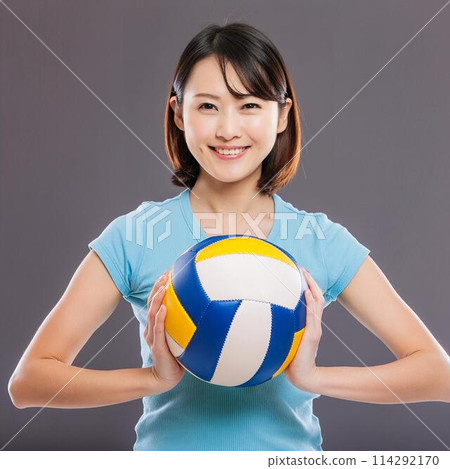 Cute woman holding a volleyball Cute woman holding a volleyball 114292170