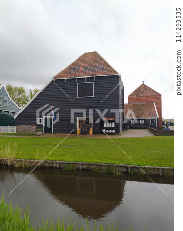 Netherlands rural lanscape Windmills at famous tourist site Zaanse Schans in Holland. Zaandam, Netherlands 114293535