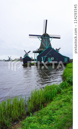 Netherlands rural lanscape Windmills at famous tourist site Zaanse Schans in Holland. Zaandam, Netherlands 114293545