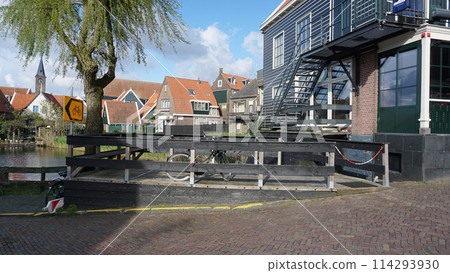 Beautiful wooden houses. Typical small Dutch houses facades in Volendam, Netherlands 114293930
