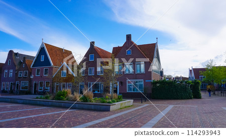 Beautiful wooden houses. Typical small Dutch houses facades in Volendam, Netherlands 114293943