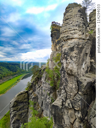 Beautiful summer view of Elbe river from Bastei view pont. Colorful morning scene of Saxon Switzerland national park, Germany, Europe. 114294033