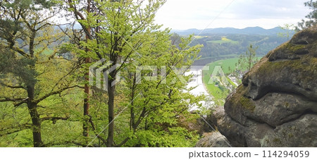 Beautiful summer view of Elbe river from Bastei view pont. Colorful morning scene of Saxon Switzerland national park, Germany, Europe. 114294059
