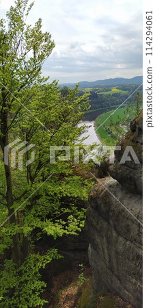 Beautiful summer view of Elbe river from Bastei view pont. Colorful morning scene of Saxon Switzerland national park, Germany, Europe. 114294061