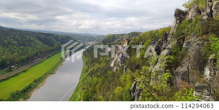 Beautiful summer view of Elbe river from Bastei view pont. Colorful morning scene of Saxon Switzerland national park, Germany, Europe. 114294063