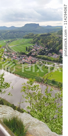 Beautiful summer view of Elbe river from Bastei view pont. Colorful morning scene of Saxon Switzerland national park, Germany, Europe. 114294067