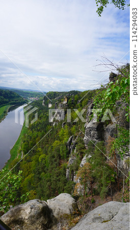 Beautiful summer view of Elbe river from Bastei view pont. Colorful morning scene of Saxon Switzerland national park, Germany, Europe. Beautiful summer view of Elbe river from Bastei view pont. Colorful morning scene of Saxon Switzerland national park, Germany, Europe. 114294083