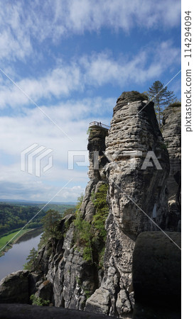 Beautiful summer view of Elbe river from Bastei view pont. Colorful morning scene of Saxon Switzerland national park, Germany, Europe. 114294094