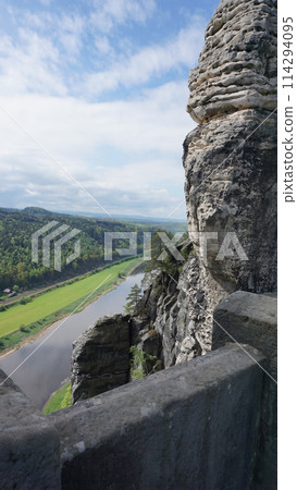 Beautiful summer view of Elbe river from Bastei view pont. Colorful morning scene of Saxon Switzerland national park, Germany, Europe. 114294095