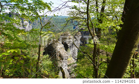 Beautiful summer view of Elbe river from Bastei view pont. Colorful morning scene of Saxon Switzerland national park, Germany, Europe. Beautiful summer view of Elbe river from Bastei view pont. Colorful morning scene of Saxon Switzerland national park, Germany, Europe. 114294101