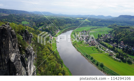 Beautiful summer view of Elbe river from Bastei view pont. Colorful morning scene of Saxon Switzerland national park, Germany, Europe. Beautiful summer view of Elbe river from Bastei view pont. Colorful morning scene of Saxon Switzerland national park, Germany, Europe. 114294106