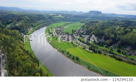 Beautiful summer view of Elbe river from Bastei view pont. Colorful morning scene of Saxon Switzerland national park, Germany, Europe. Beautiful summer view of Elbe river from Bastei view pont. Colorful morning scene of Saxon Switzerland national park, Germany, Europe. 114294110