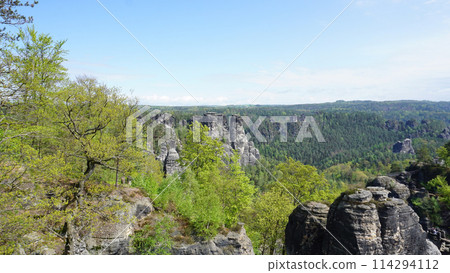 Beautiful summer view of Elbe river from Bastei view pont. Colorful morning scene of Saxon Switzerland national park, Germany, Europe. 114294112