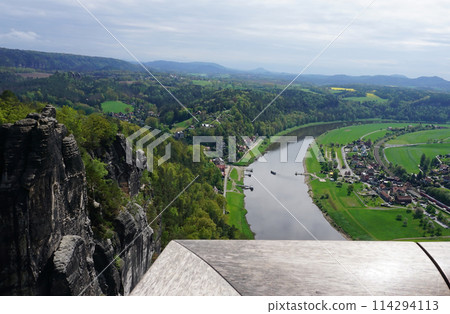 Beautiful summer view of Elbe river from Bastei view pont. Colorful morning scene of Saxon Switzerland national park, Germany, Europe. Beautiful summer view of Elbe river from Bastei view pont. Colorful morning scene of Saxon Switzerland national park, Germany, Europe. 114294113