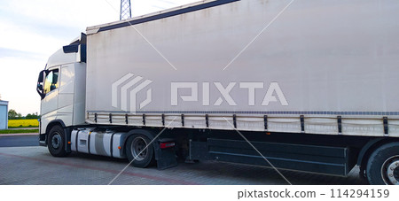 Trucks at parking lot. Delivery Trucks. Cargo Shipping. Lorry. Industry Freight Truck Logistics Cargo Transport Concept. 114294159