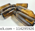 Empty brown bottle 114295926