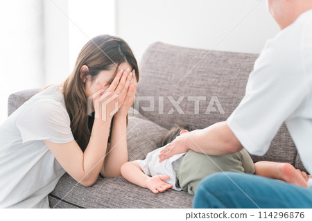 A young Asian couple who are worried, troubled, thinking, and depressed about raising children 114296876