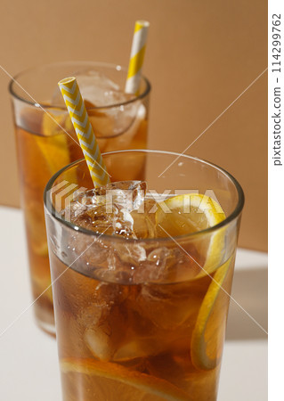 Glasses of cold tea with an orange 114299762