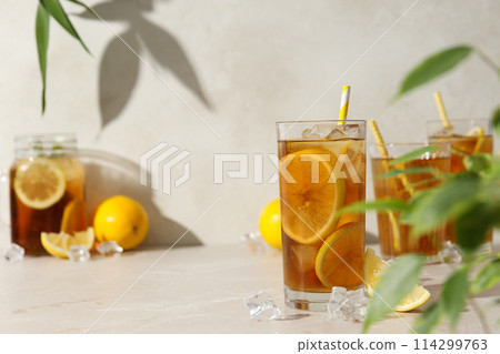 Cold tea with fresh oranges and mint leaves Cold tea with fresh oranges and mint leaves 114299763