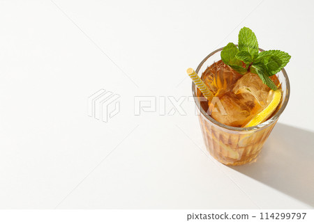 A glass of delicious cold tea on a white background 114299797