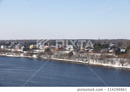 river on a sunny evening. Trees and shrubs. Landscape of winter nature, river banks river on a sunny evening. Trees and shrubs. Landscape of winter nature, river banks 114299861