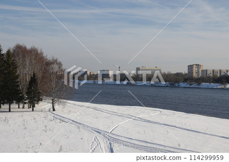 river on a sunny evening. Trees and shrubs. Landscape of winter nature, river banks river on a sunny evening. Trees and shrubs. Landscape of winter nature, river banks 114299959