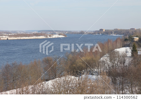 river on a sunny evening. Trees and shrubs. Landscape of winter nature, river banks river on a sunny evening. Trees and shrubs. Landscape of winter nature, river banks 114300562