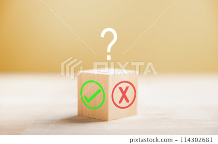 Wooden block illustrates choice with green check mark and red x. Decision-making concept highlighted. Think With Yes Or No Choice. 114302681