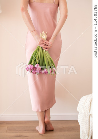 Dad and son in the front seat of a car driving a black car 114303768