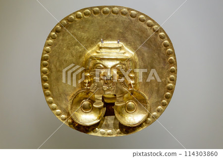 Pre-Columbian gold artifact in the Museo del Oro. Famous Gold Museum, Bogota, Colombia. Pre-Columbian gold artifact in the Museo del Oro. Famous Gold Museum, Bogota, Colombia. 114303860