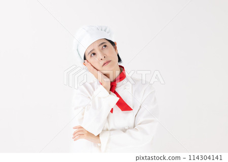 Middle-aged woman, chef uniform, worries 114304141