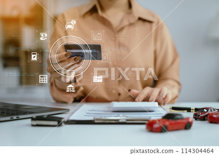 Closeup a car key and money for loan credit financial, lease and rental concept. Closeup a car key and money for loan credit financial, lease and rental concept. 114304464