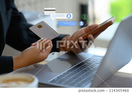 Businessman holding credit card making payment digital transaction paying online on smartphone 114305468