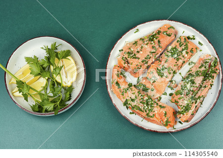 Fresh marinated salmon fish. 114305540
