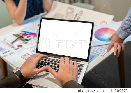 Website designer, Creative planning phone app development template layout framework wireframe design, Young asian man UX designer working on laptop white mock up screen at office Website designer, Creative planning phone app development template layout framework wireframe design, Young asian man UX designer working on laptop white mock up screen at office 114309271
