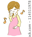 Smiling pregnant woman rubbing her belly 114311978