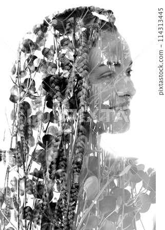 A black and white double exposure portrait of a smiling woman with dreadlocks A black and white double exposure portrait of a smiling woman with dreadlocks 114313445
