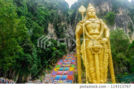Batu Caves with its stairs and golden statue 114313767