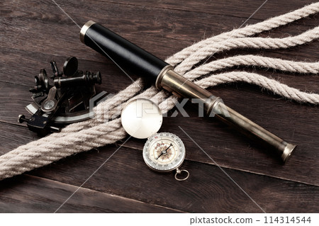 vintage naval spyglass telescope with sextant and compass 114314544