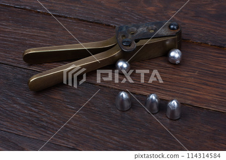 old west bullet mold with bullets for revolver. old west bullet mold with bullets for revolver. 114314584