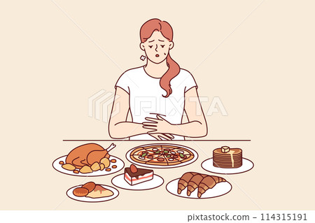 Problem of overeating in woman sitting at table with fast food, and in need of balanced diet 114315191