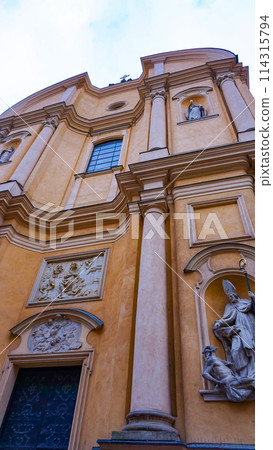 Sculpture on the facade of St. Martin's Church in Warsaw, Poland 114315794