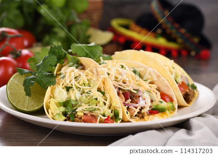 Beef and avocado tacos 114317203