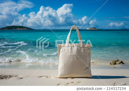 a photo featuring a blank eco cotton tote bag against a tropical sea background 114317234